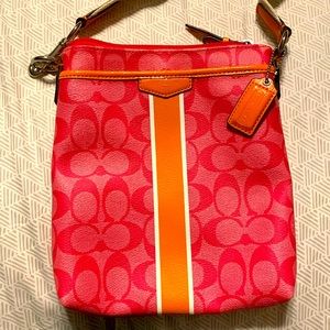 NWOT pink and orange Coach body bag with adjustable cloth strap